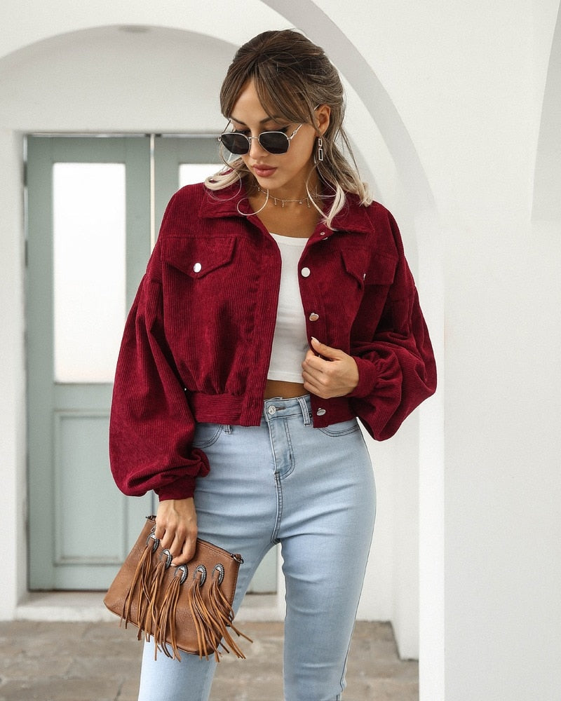 Burgundy cropped jacket with flap pockets and button front, long puff sleeves
