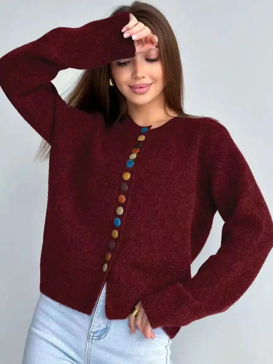 Wine red knit cardigan with long sleeves and vertical button placket