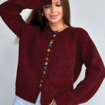 Wine red knit cardigan with long sleeves and vertical button placket