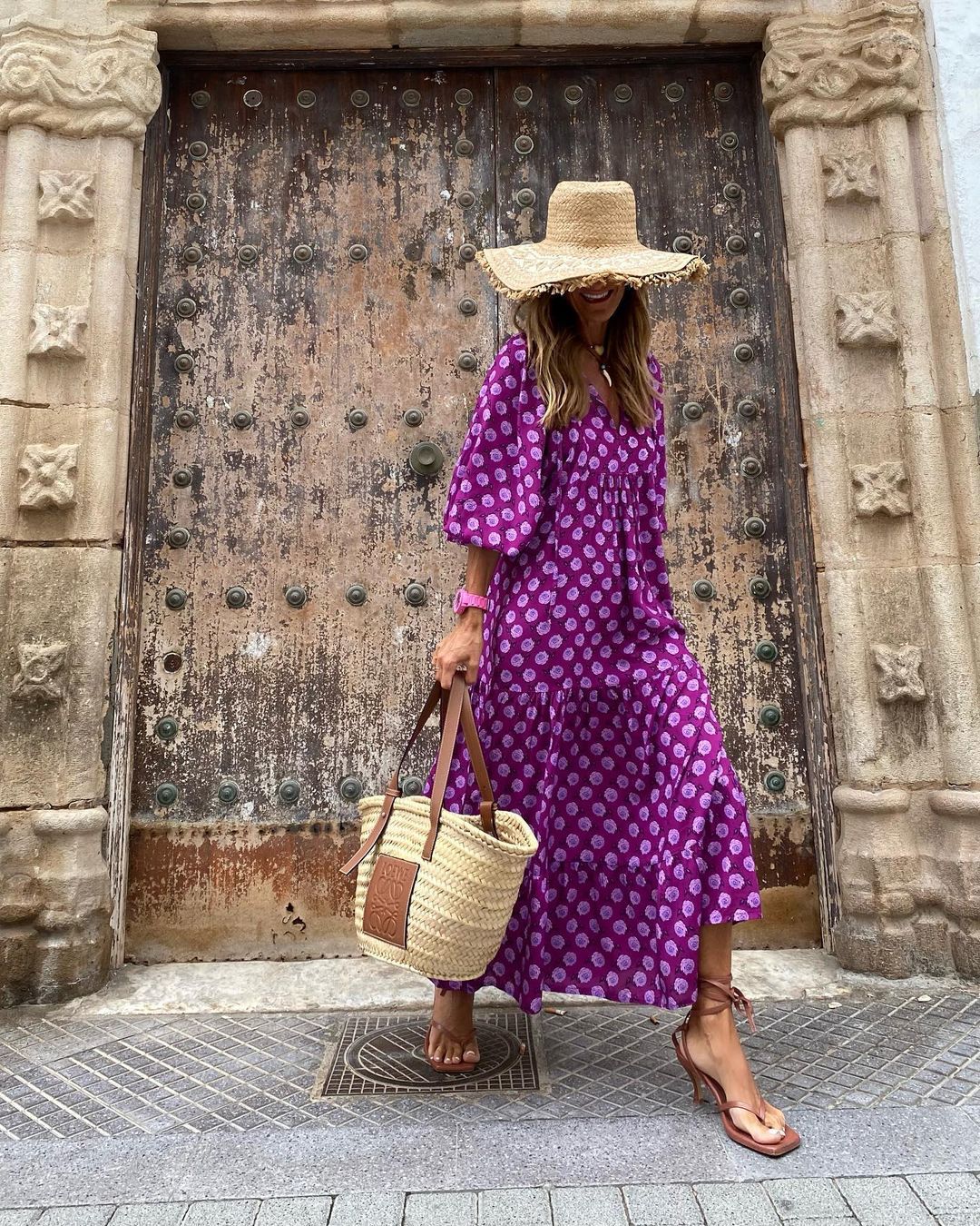 Bohemian maxi dress in purple with small white dot pattern and elbow-length sleeves