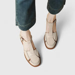 Light beige Mary Jane sandals with T-strap and metal buckle, low block heel