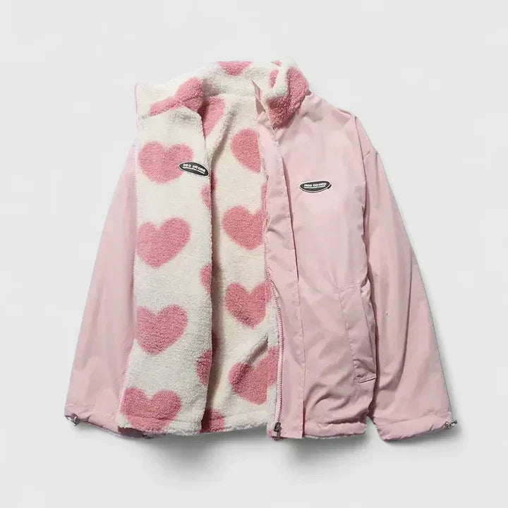 Light pink fleece jacket with pink heart print, full-zip, hood, pastel side panels