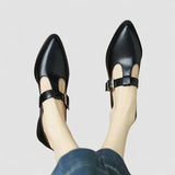 Orthopedic Mary Jane shoes, black upper with buckled instep strap and low block heel