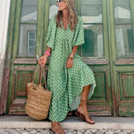 Bohemian maxi dress in green with white diamond pattern, three-quarter length sleeves