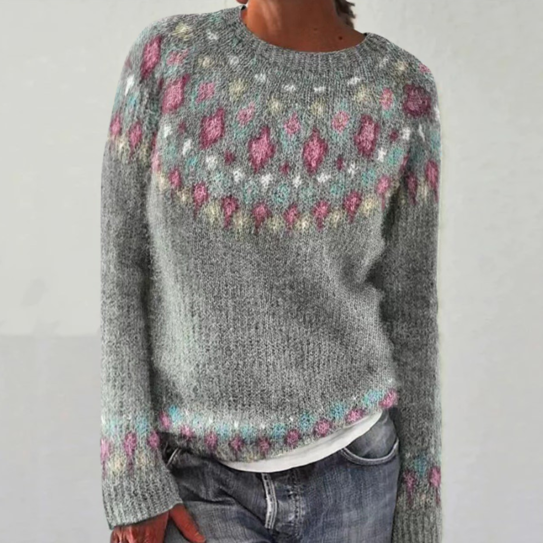 Heather gray retro pullover sweater with pink and purple floral knit motifs.