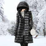 Black hooded long puffer jacket with front zipper and quilted panels