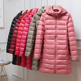 Light pink hooded quilted puffer jacket with front zipper and long sleeves