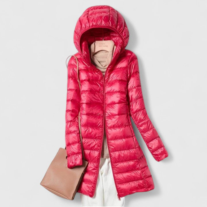 Long hooded puffer jacket with front zipper, vivid red/pink colorway.