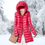 Red hooded long puffer jacket with zip front and quilted insulation