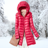 Red hooded long puffer jacket with zip front and quilted insulation
