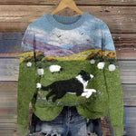 Soft-touch hoodie with blue-to-green landscape print and standing dog graphic