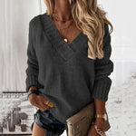 Charcoal V-neck knit pullover sweater with long sleeves and ribbed trim
