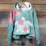 Comfort hoodie in teal with colorful floral print and kangaroo pocket