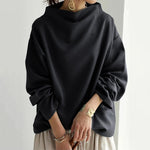 Black high-neck soft knit top with oversized sleeves and drop-shoulder style