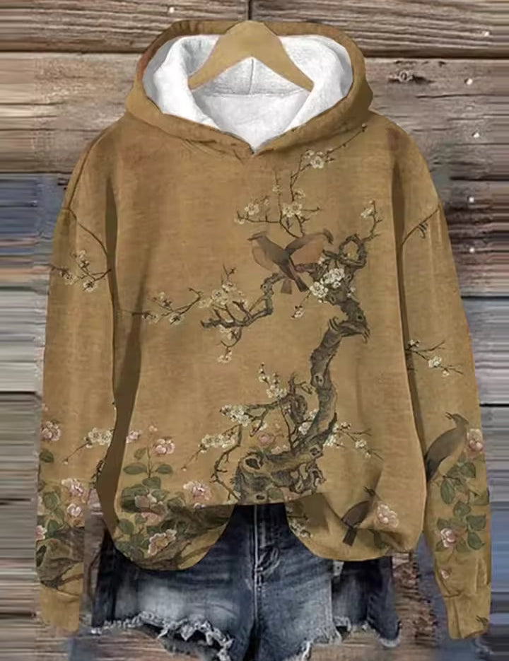 Mustard knit hoodie with hood and illustrated floral vine graphic on front