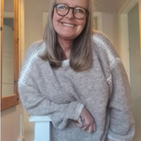 Heather gray knit pullover sweater with round neck and ribbed cuffs, relaxed fit