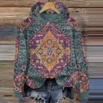Teal and purple patterned hoodie with orange center, drawstring hood, kangaroo pocket