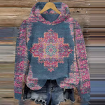 Teal and pink patterned hoodie with drawstring hood and kangaroo pocket