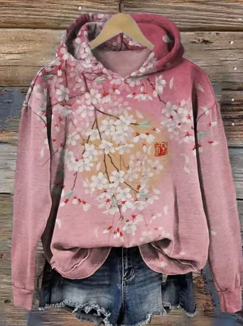Pink classic hoodie with floral cherry blossom print and drawstring hood
