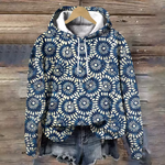 Soft knit hoodie in dark blue with white circular floral pattern, front hood