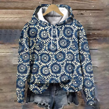 Soft knit hoodie in dark blue with white circular floral pattern, front hood