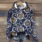 Soft knit hoodie in dark navy with gold and cream floral print, front hood