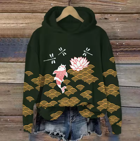 Mabel comfort hoodie, dark green with red figure, pink flowers, and gold wave pattern
