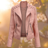Light pink moto jacket with notched lapels, zip pockets, and zipper front closure