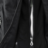 Charlotte™ comfortable jacket close-up with dark full-zip and silver zipper pull