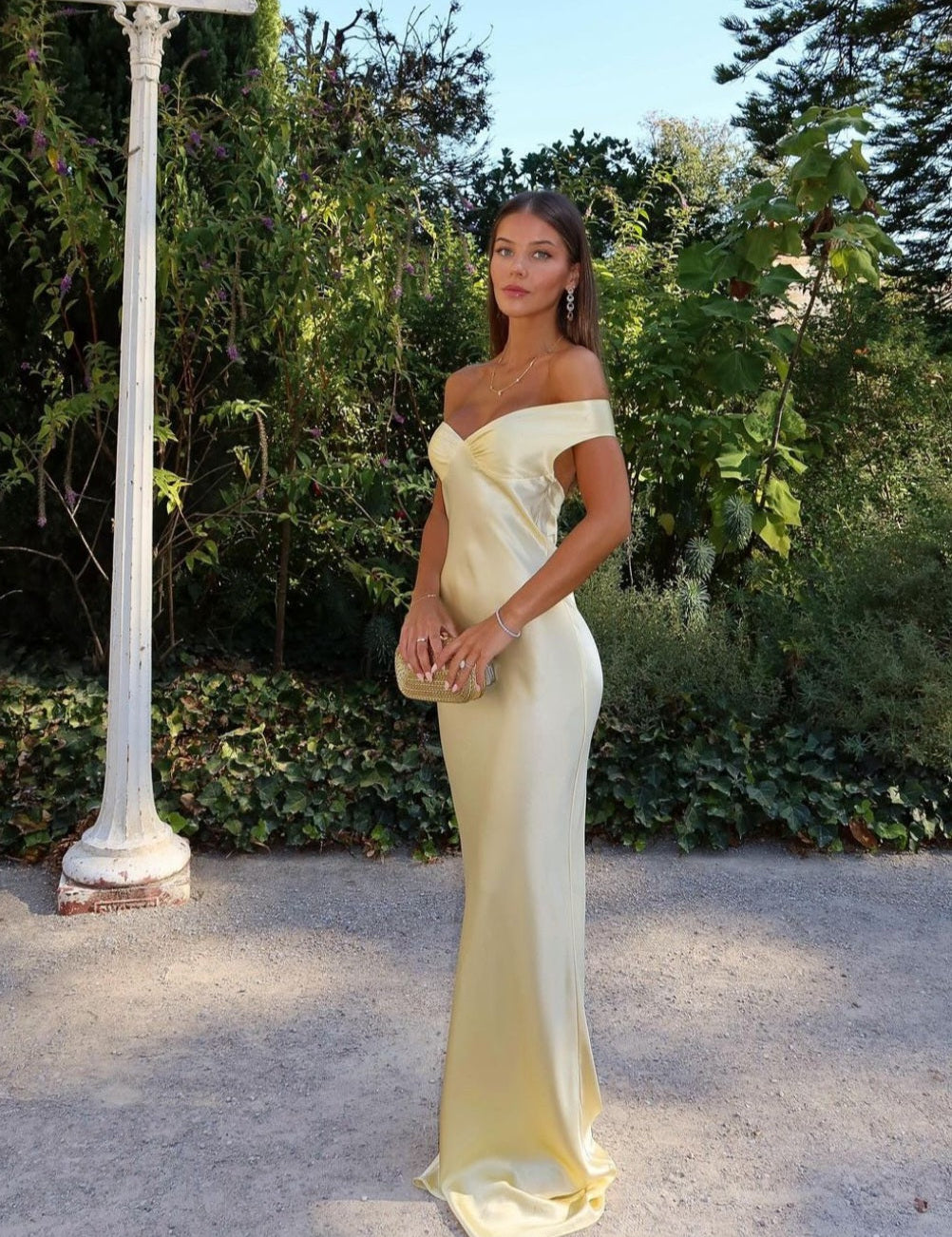 Light gold strapless satin evening dress with sweetheart neckline and long fitted skirt