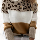 Leopard colorblock pullover sweater with cream, dark brown, and tan panels