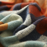 Multicolor plaid knit fabric detail with visible yarn texture