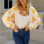 White cropped V-neck cardigan with long sleeves and yellow floral print
