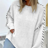 White chunky knit pullover with crew neck and contrast stitched puff sleeves