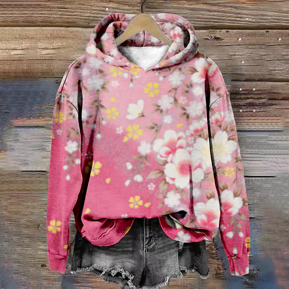 Pink floral pullover hoodie with kangaroo pocket and drawstring hood