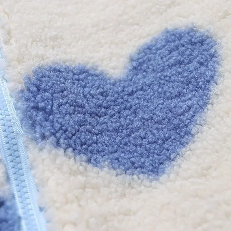 Blue heart pattern fuzzy fleece fabric with zipper edge