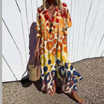 Bohemian maxi dress with multicolor abstract print, V-neck, button front, short sleeves