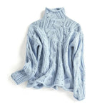 Light blue cable-knit pullover with high neck and long sleeves