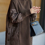 Dark brown patchwork turtleneck sweater with ribbed hem and quilted sleeves