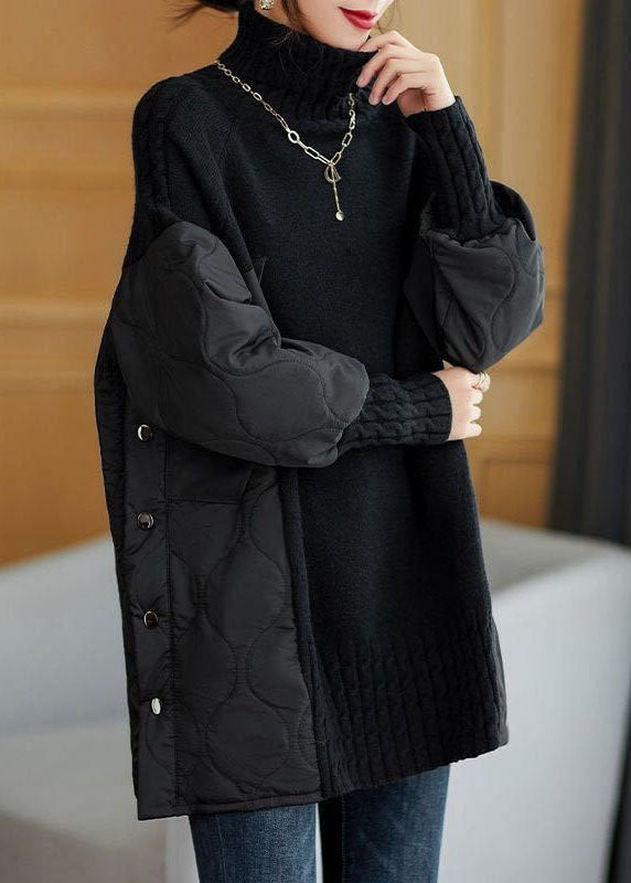 Black patchwork turtleneck sweater with ribbed cuffs and quilted front detailing