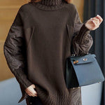 Dark brown knit turtleneck sweater with textured patchwork sleeves and side panels