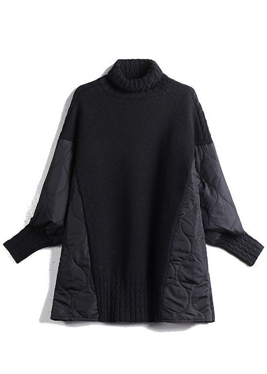 Black patchwork turtleneck sweater, ribbed collar and hem with quilted side panels