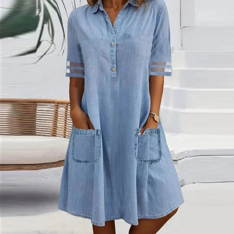 Light blue denim mini dress with button front, tab collar, short sleeves, side pockets