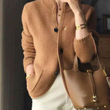 Caramel knit cardigan with button front and dark buttons, long sleeves