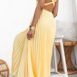 Yellow pleated maxi dress with V-neck and open back strap detail