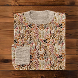 Floral knit pullover, cream with multicolor plant print, crew neck, long sleeves