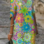 Floral print V-neck dress, loose fit, colorful circular flower pattern in teal and pink