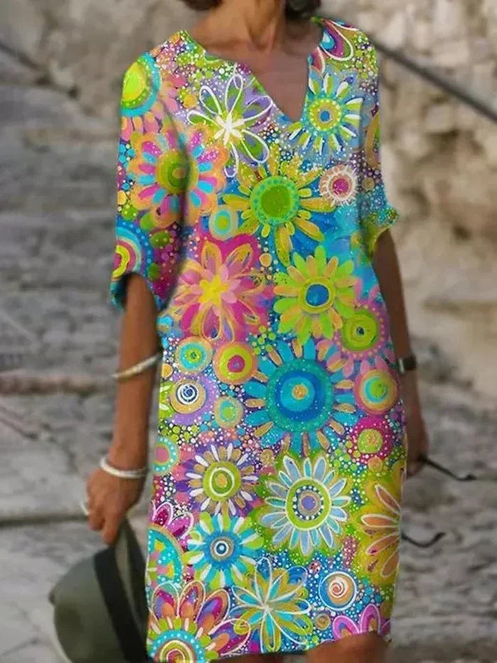 Floral print V-neck dress, loose fit, colorful circular flower pattern in teal and pink