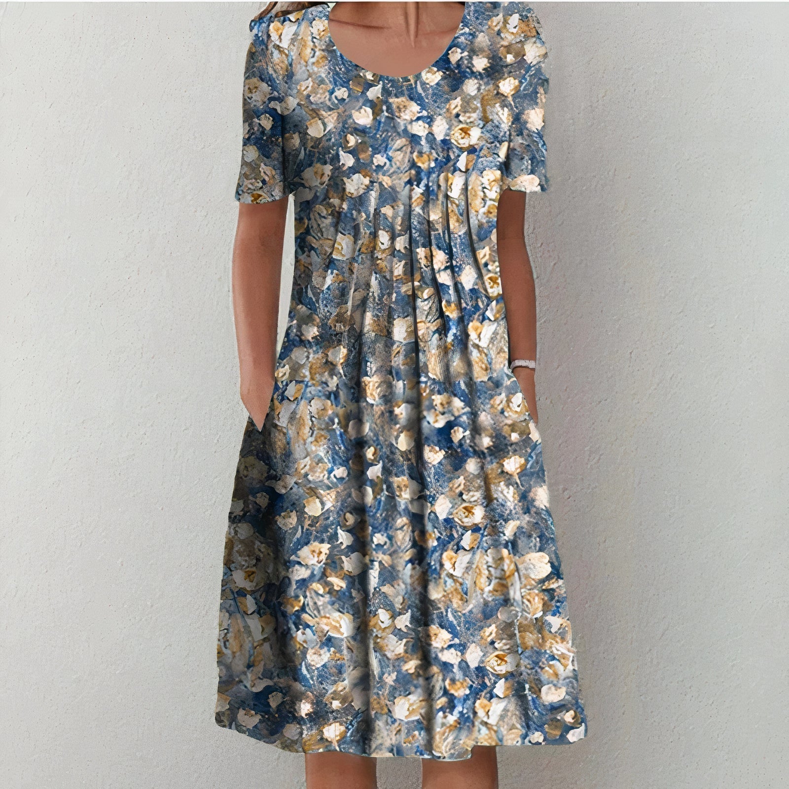 Blue and beige floral midi dress with scoop neckline and short sleeves, gathered skirt
