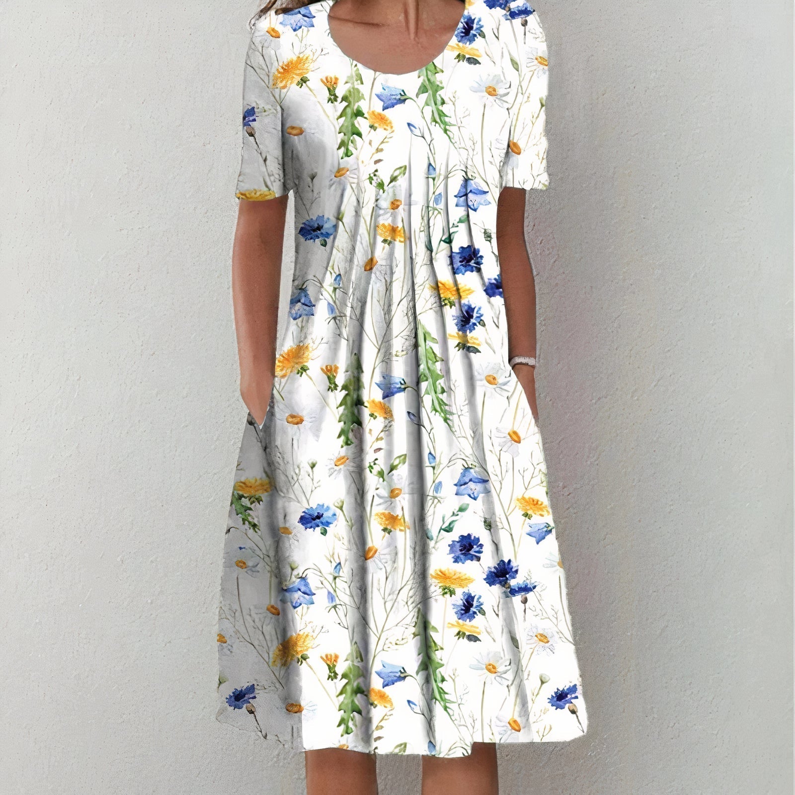 White floral midi dress with scoop neckline and short sleeves, gathered skirt
